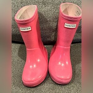 Hunter glitter rain boots.